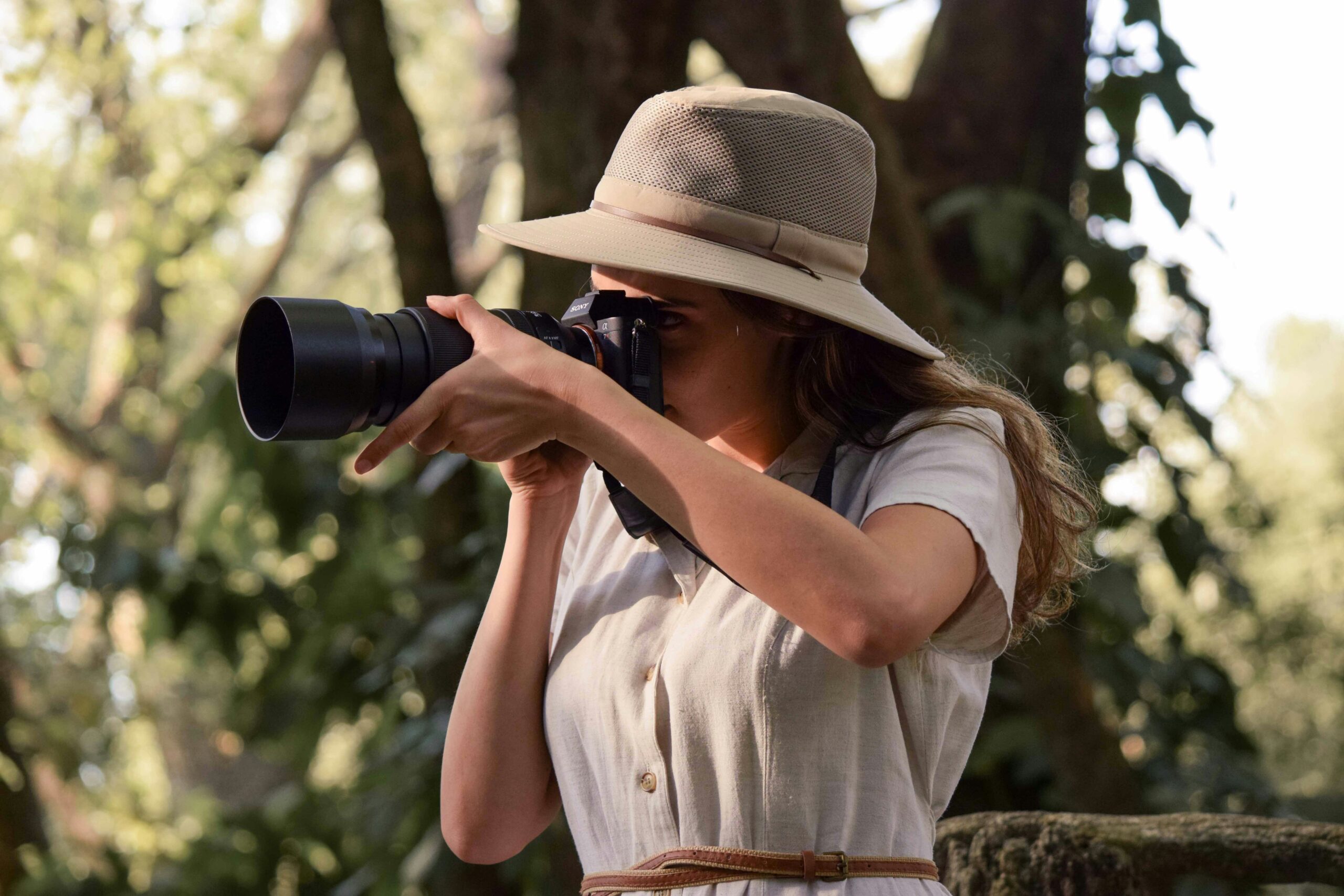 female-photographer-safari-attire-maasai-mara-kenya time in kenya now