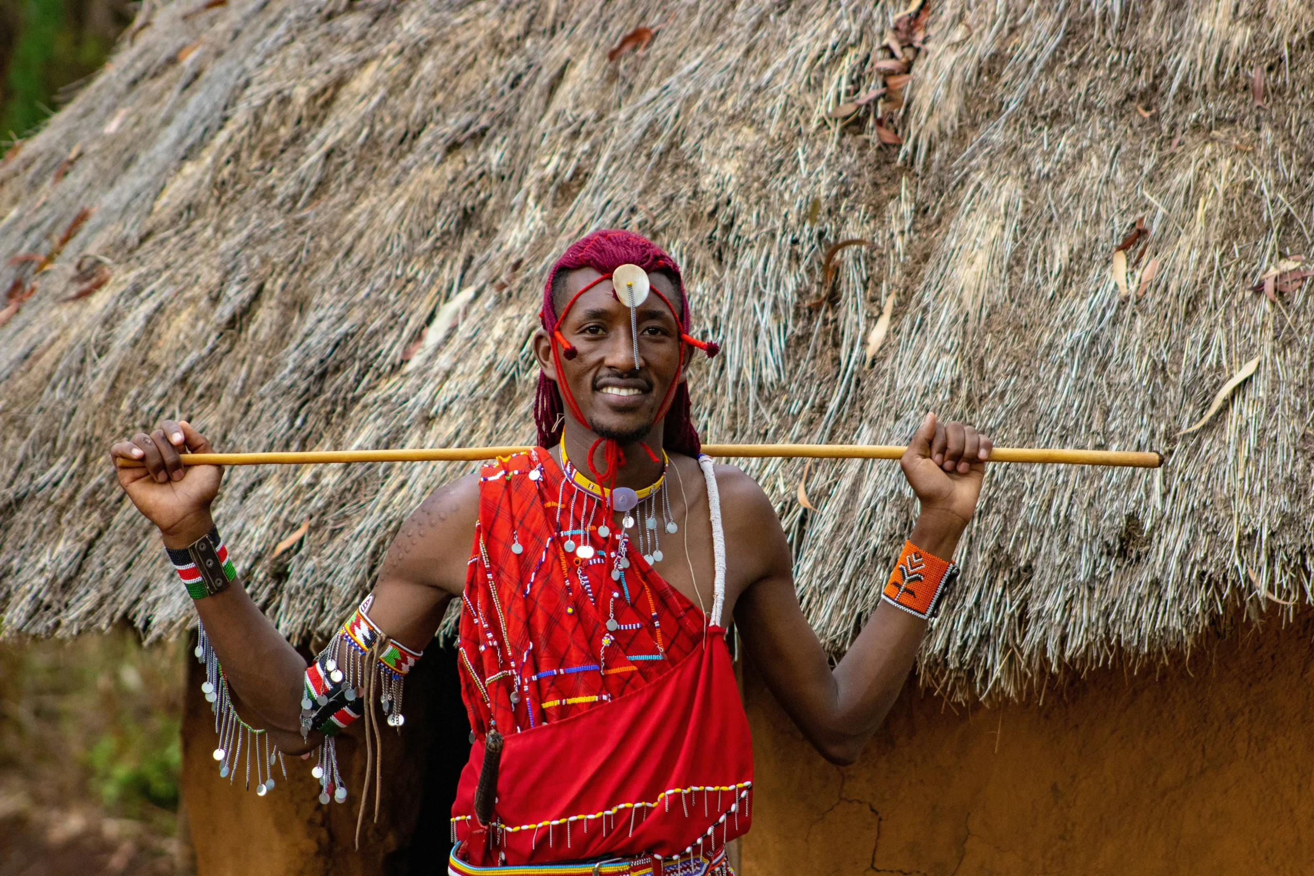 a maasai warrior in a maasai village visit