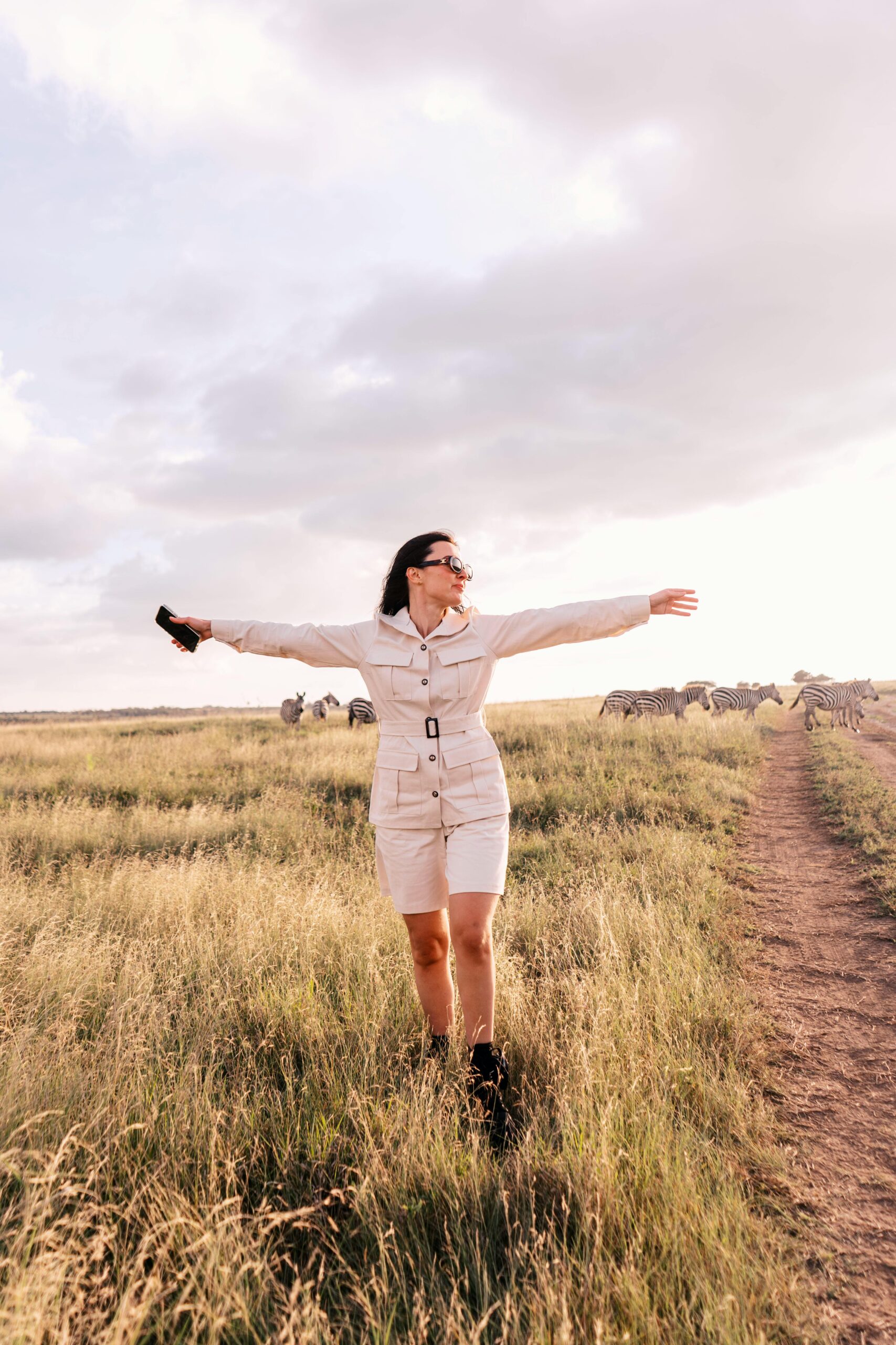 kenya - solo female traveler enjoying a safari in nairobi national park