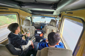 Kids staying inside the safari vehicle is one of the safari safety for children precautions