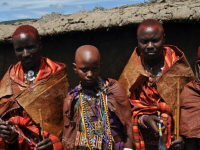 prem-gangar-Aj2HsF8ko0w-unsplash Traditional Maasai village with manyatta huts in the savanna landscape of Kenya.